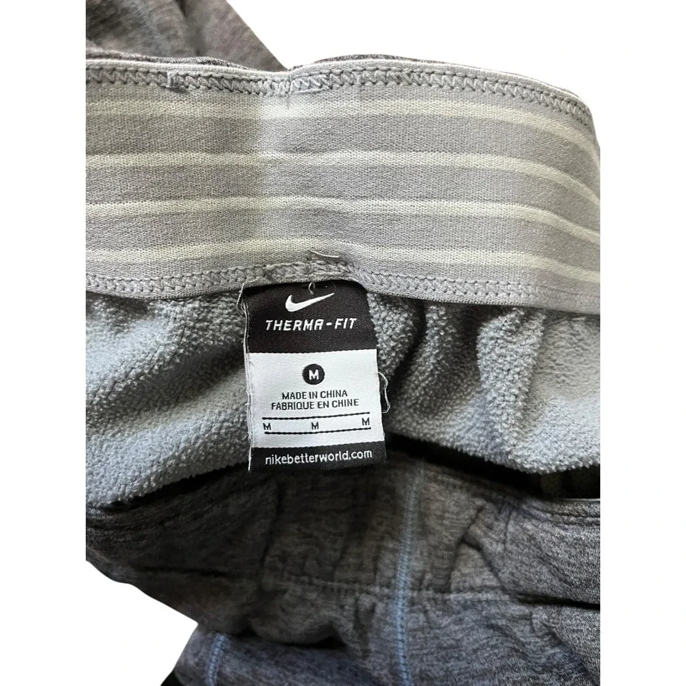 Nike Therma-FIT Fleece Track Pants with Zipper Cuffs